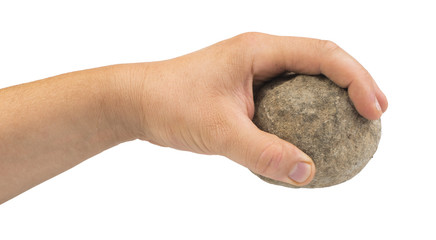 Hand holding stone ball