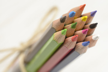 Fototapeta premium Colored pencils tied together