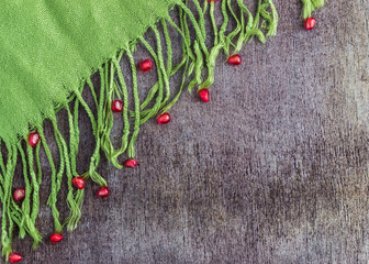 Pomegranate with green table cover