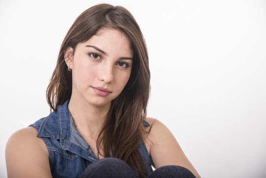 Beautiful young model with brown hair, slim and youthful