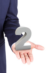Business man holding a 3d number in hand palm