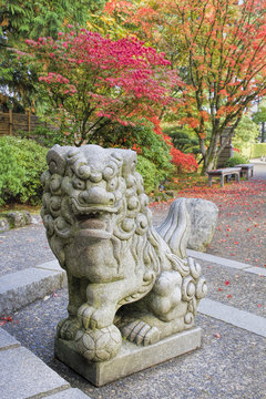 Japanese Komainu Male Foo Dog Sculpture in Fall Season