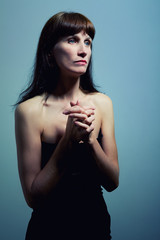 Fototapeta premium mature woman prays