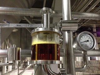 transparent screen to check beer quality at the brewery