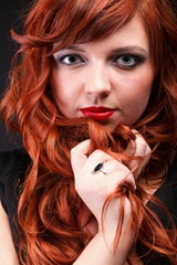 Fototapeta premium lovely redhead - Young beautiful red haired woman