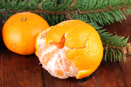 Tasty mandarines  on wooden background