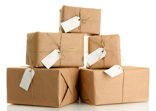 parcels boxes with kraft paper, isolated on white