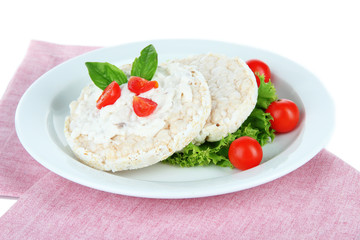 Tasty crispbreads with vegetables, isolated on white