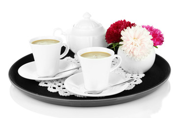 Cups of coffee on tray isolated on white