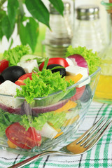 Greek salad on plate on table close-up