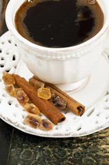 cup of coffee on old book