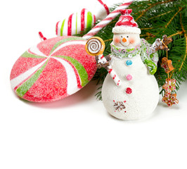 snowman with sweets isolated on white background