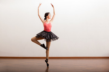 Cute ballet dancer performing