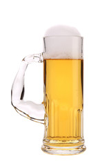 Tall narrow glass of beer.