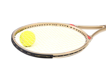 Gray tennis racket and yellow ball
