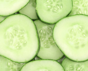 Background of sliced fresh cucumbers.