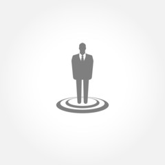 Businessman standing on the target - vector icon