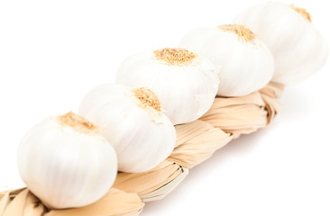 garlic plait isolated on white