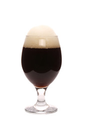 Closeup of brown beer glass.