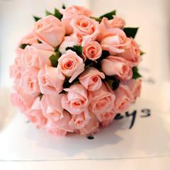 Wedding bouquet of pink roses.