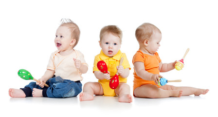 Children playing with musical toys