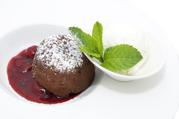 dessert, a piece of cake on the table with a cup of tea