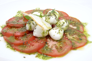 salad of arugula and tomato meat