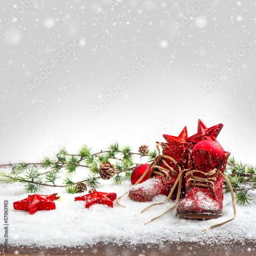 &quot;nostalgic christmas decoration with antique baby shoe&quot; Stockfotos und