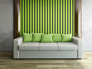 Leather sofa with green pillows