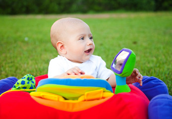 Cheerful cute kid on the nature