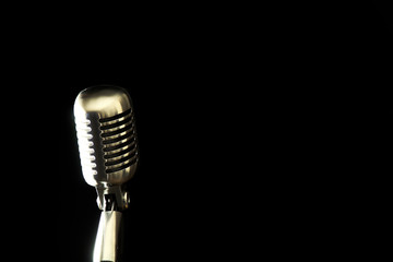 Fototapeta premium Retro Microphone on Black