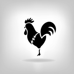 The black stylized cocks on a white background