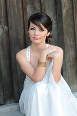 Fototapeta premium Portrait of a beautiful girl in white. Gentle and elegant style.