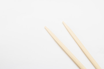 Chopsticks on grey background