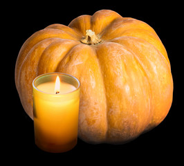 The candle burns before pumpkin