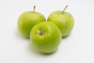 Three green apple on white background