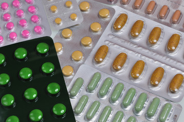 assortment of pills and capsules