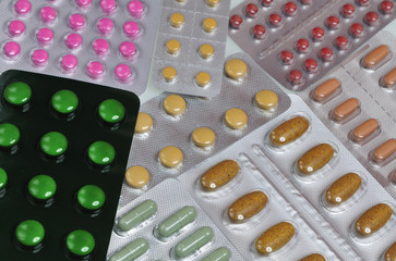 assortment of pills and capsules