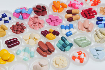 assortment of pills and capsules
