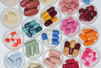assortment of pills and capsules