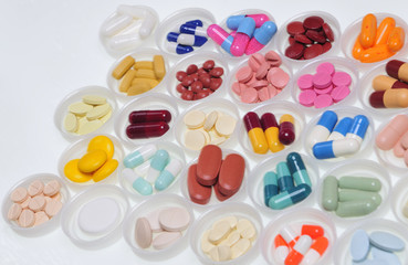 assortment of pills and capsules