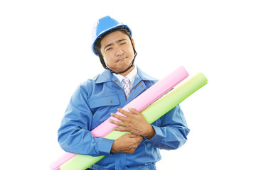 疲れた表情の作業員