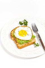 Fototapeta na wymiar Healthy Breakfast. Egg and Avocado Toast.
