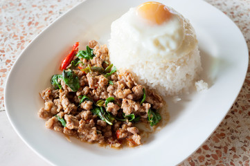 Rice with stir fried hot and spicy pork with basil
