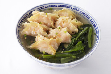 Shrimp wonton soup on white background