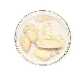 banana in coconut milk in glass bowl  - Thai dessert