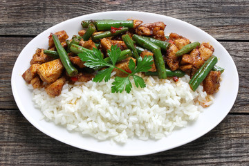 Chicken meat with green beans and rice