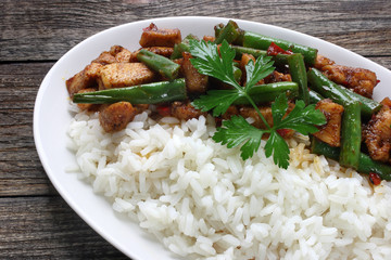 Chicken meat with green beans and rice