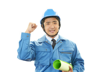 ガッツポーズの作業員