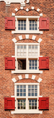 Fototapeta na wymiar Traditional dutch windows in Amsterdam
